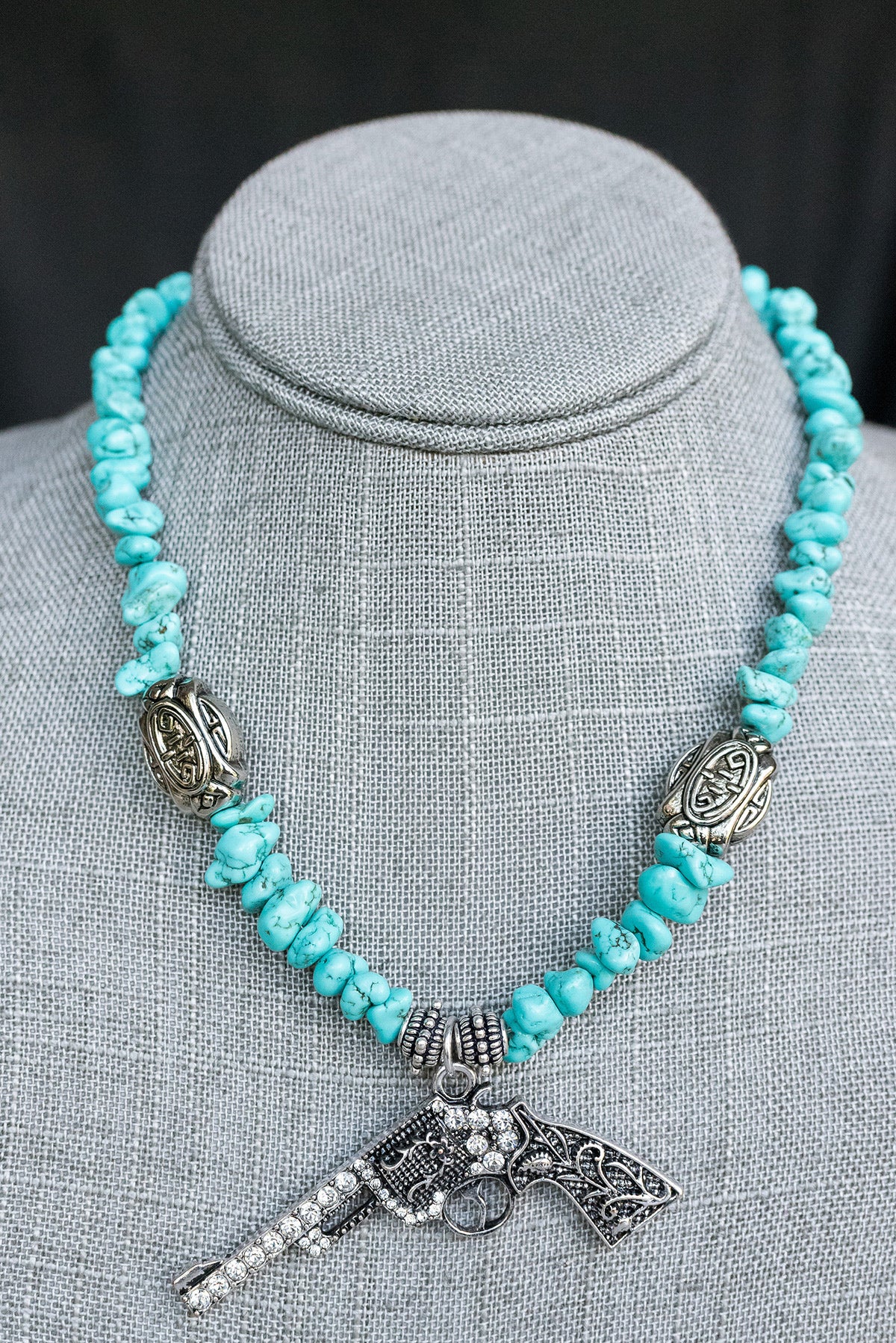 Turquoise Beaded Necklace with Rhinestone Pistol Pendant